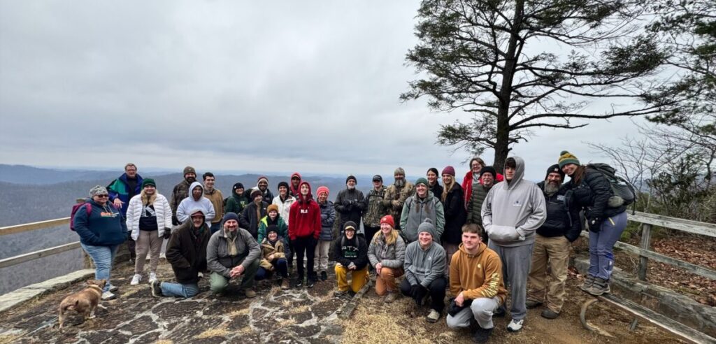 group of hikers on Pine Mountain at Kingdom Come State Park with KNLT guided hike